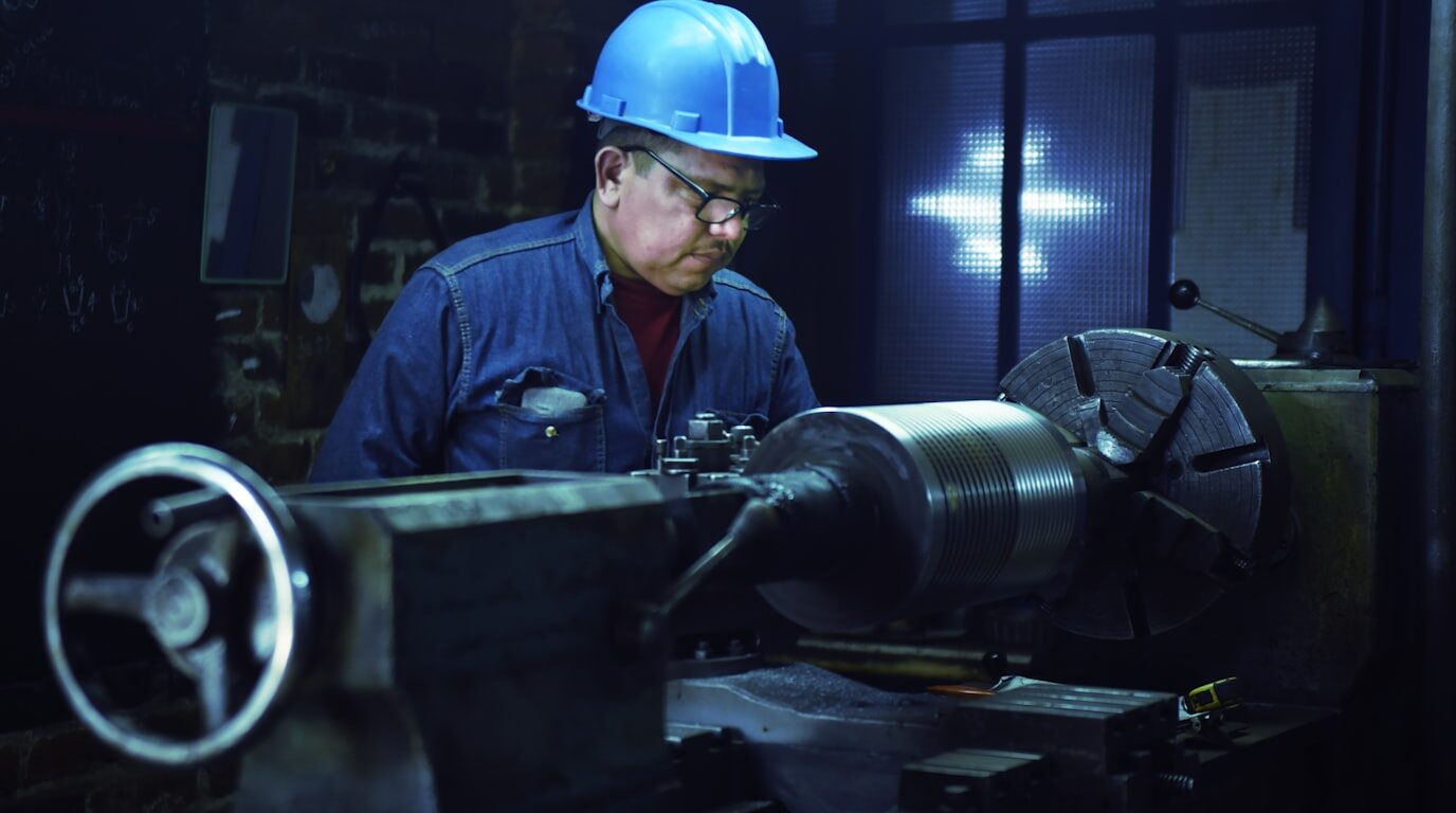 Technician calibrating industrial equipment.