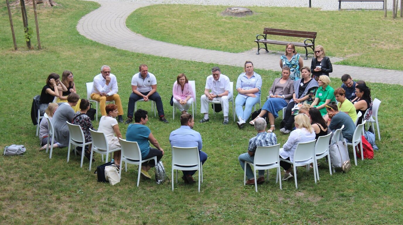 Community members in discussion.